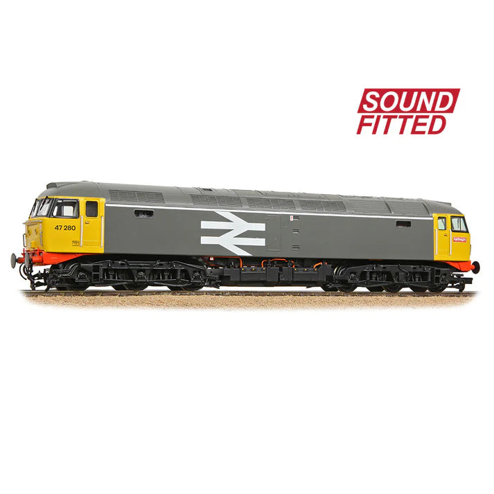 Model train with a gray and yellow design on a white background, featuring the word 'Sound Fitted'.