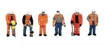 Set of model figures in construction worker outfits with tools on a white background