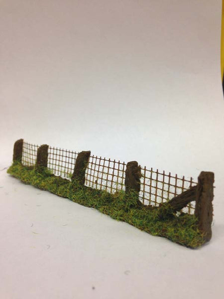 OO Gauge Model fence with wire mesh on a white background for model railway scenery