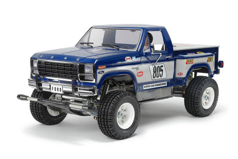 Model truck radio controlled with a blue colour scheme on a white background