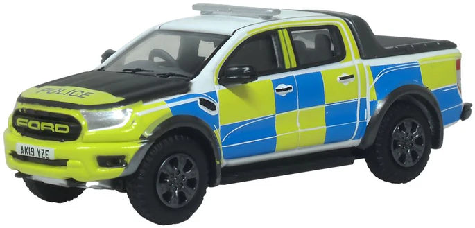 Model police car with a checkered pattern on a white background