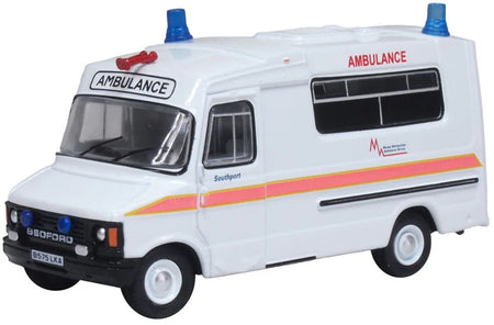 Diecast Model of a Merseyside ambulance with blue lights on a white background