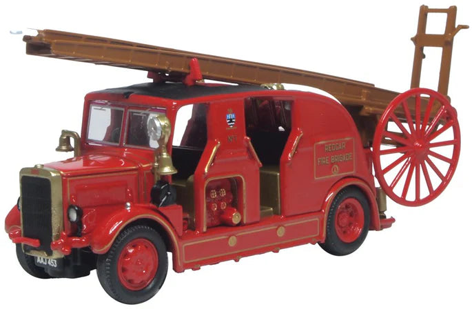 Model of a vintage fire truck with a ladder on a white background