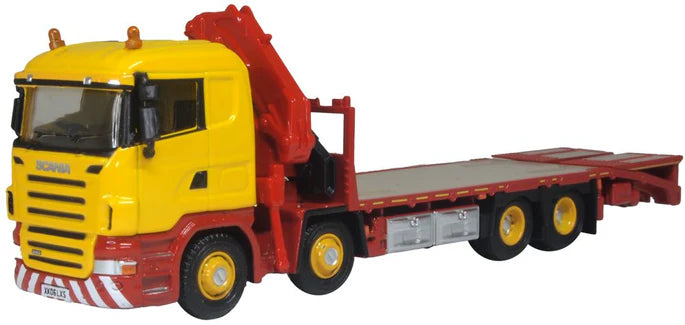 Model of a yellow and red tow truck on a white background