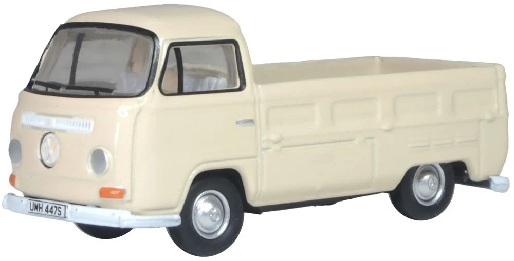 Model of a beige-colored pick up truck on a white background