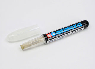 Blue pen with a white cap on a blue background