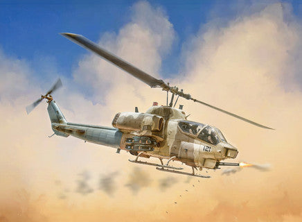 Military Bell AH-1W Super Cobra helicopter flying through a desert with dust clouds