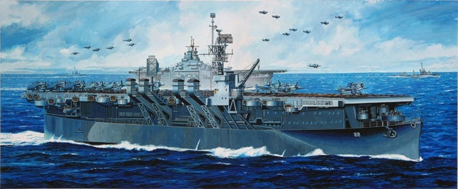 Dragon 1024 USS Independence  a large grey aircraft carrier at sea with multiple fighter jets flying overhead, under a blue sky with white clouds.