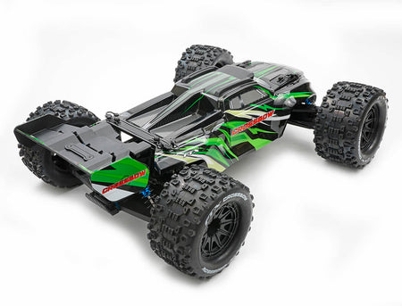 Green and black off-road r/c model car on a white background