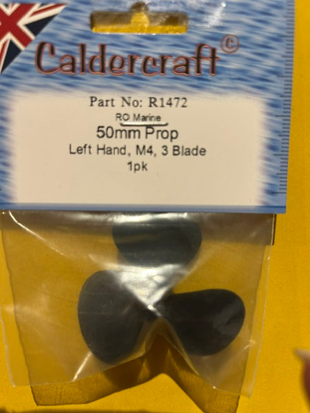 Caldercraft 50mm prop left hand M4 blade in packaging on a yellow background