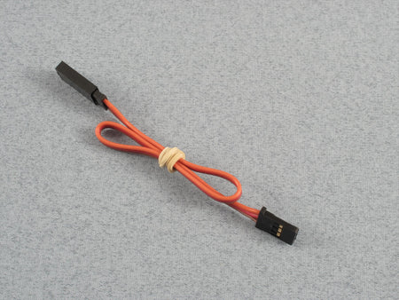 Orange cable with black connectors on a grey background