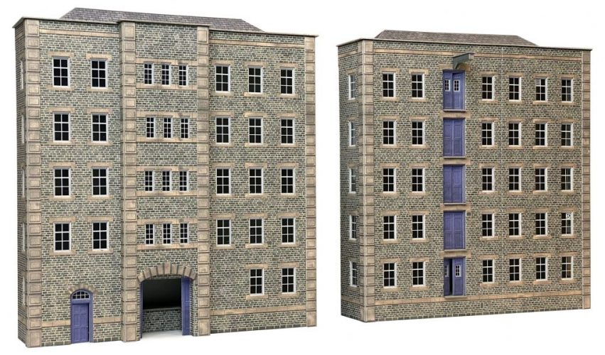 Two model buildings made of stone with blue doors on a white background