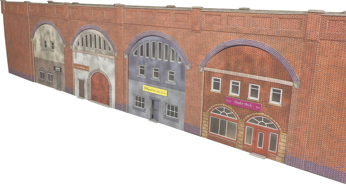 Model of a row of railway arch infills  on a white background