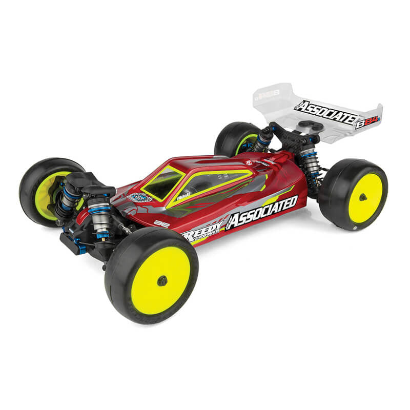 Red and yellow B84D Team Associated RC car with 'Associated' branding on a white background supplied as a  kit