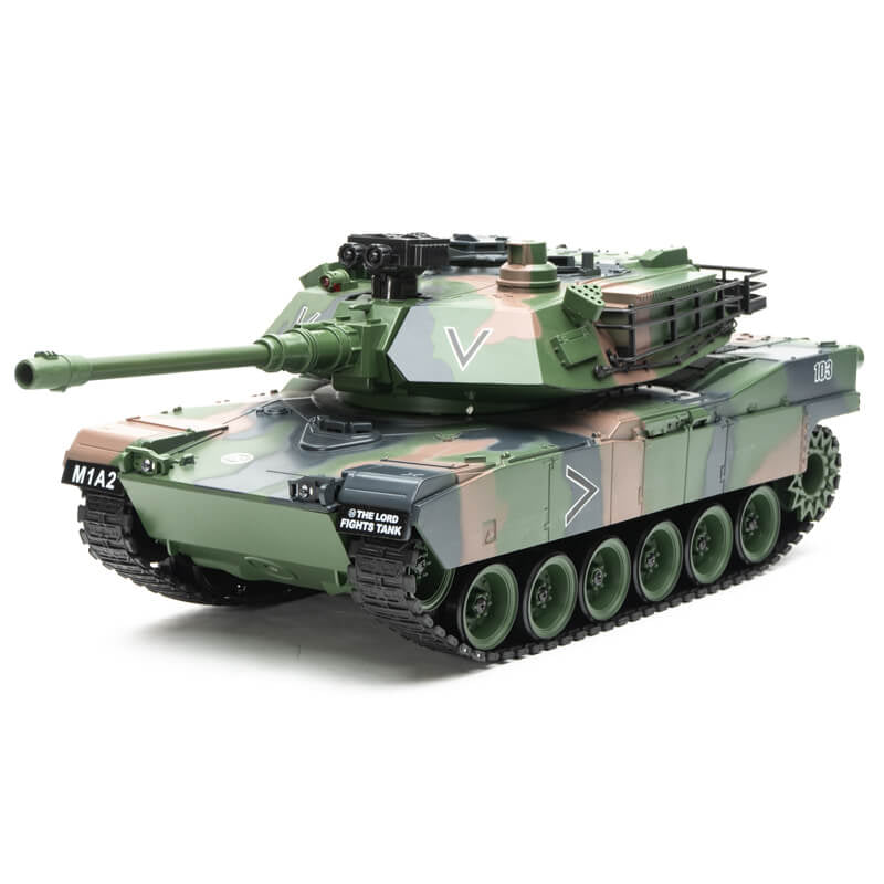 A green camouflage remote control tank toy with black tracks and treads, featuring white markings including 'M1A2' and a large 'V' on the turret, shown on a white background.