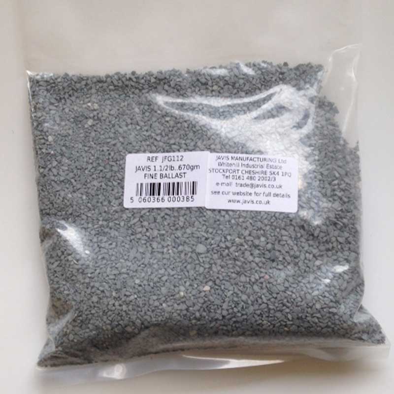 Bag of gray fine ballast with a label on a white background