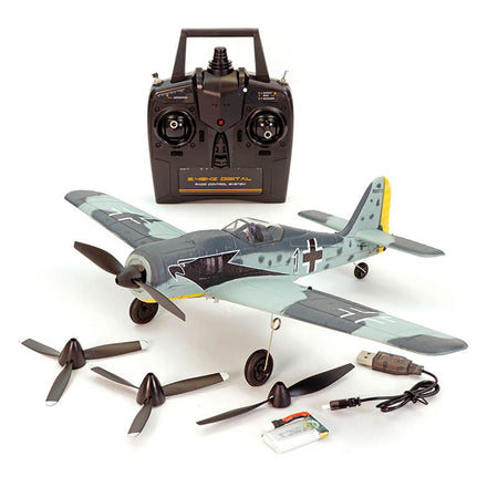 Model airplane with remote control and accessories on a white background
